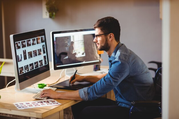 Man working with photos on computer